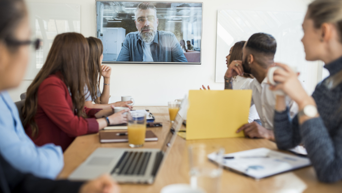 A group of business people holding a meeting