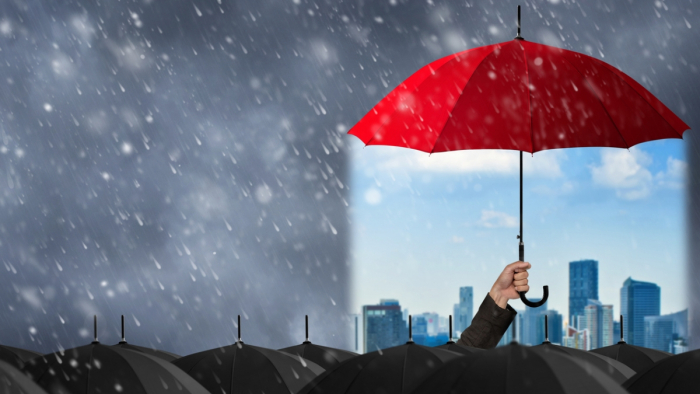 Red umbrella with sun underneath