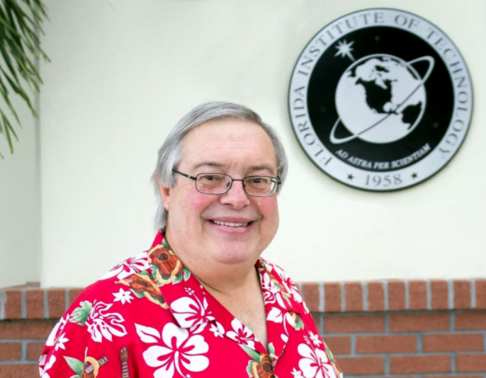 Jose Martinez-Diaz in front of Florida Institute of Technology sign